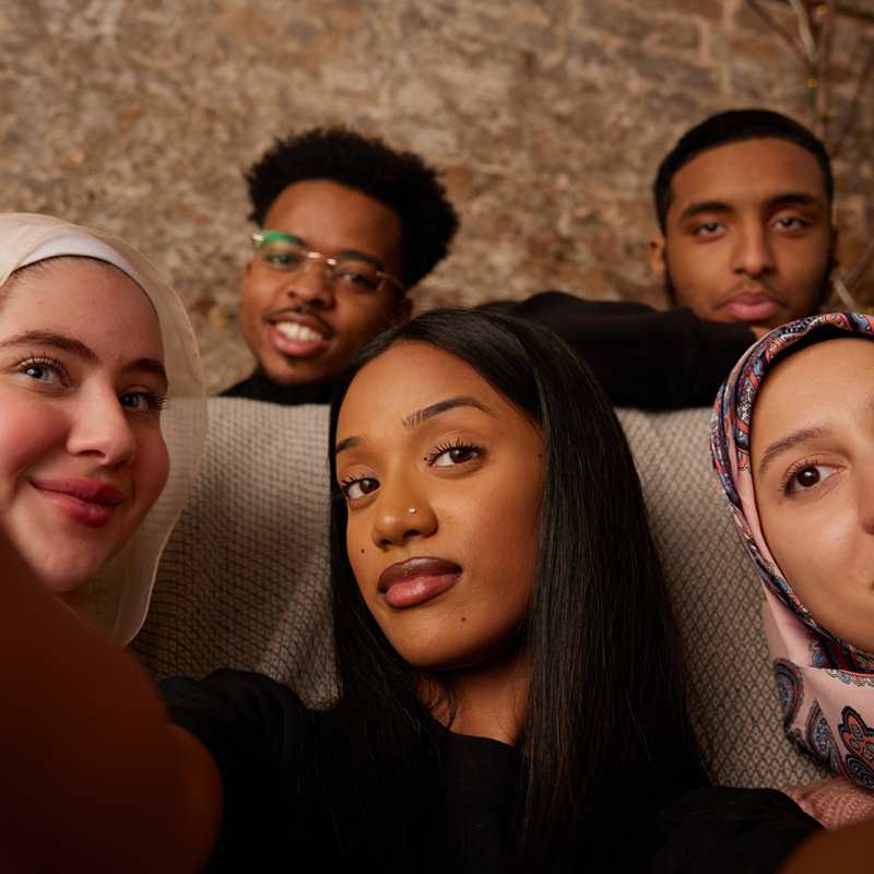 A selfie of a group of young people.