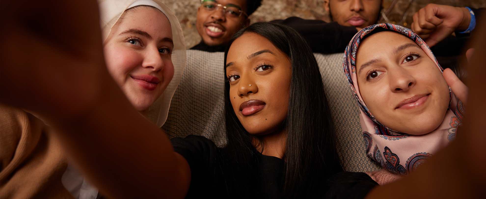 A selfie of a group of young people.