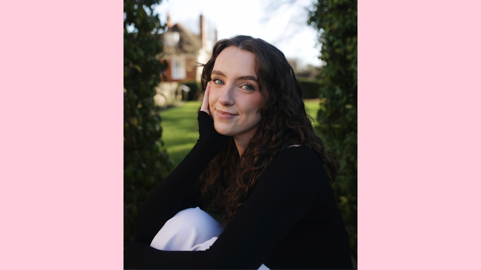 Photo of Ambassador Ro Mitchell, smiling and looking at the camera. 